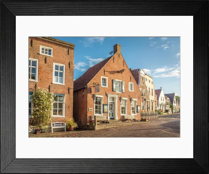 Framed Print : Historic brick houses at the harbor in Greetsiel, East Frisia, Lower Saxony, Germany