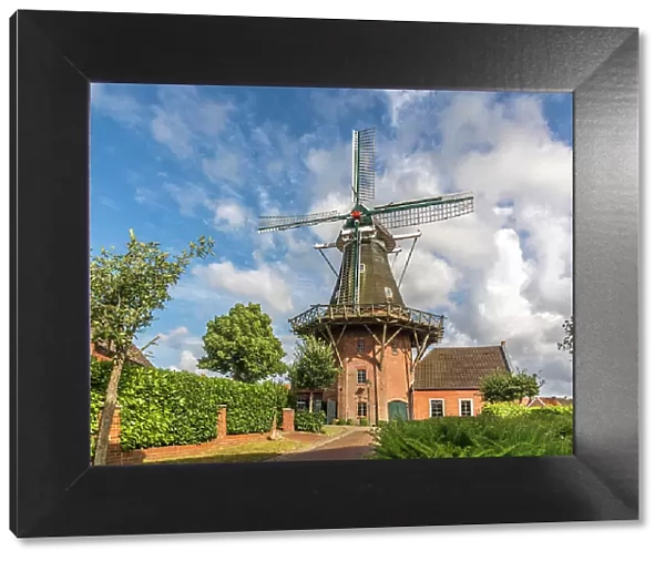 Windmill in the village of Rysum, Krummhoern, East Frisia, Lower Saxony, Germany