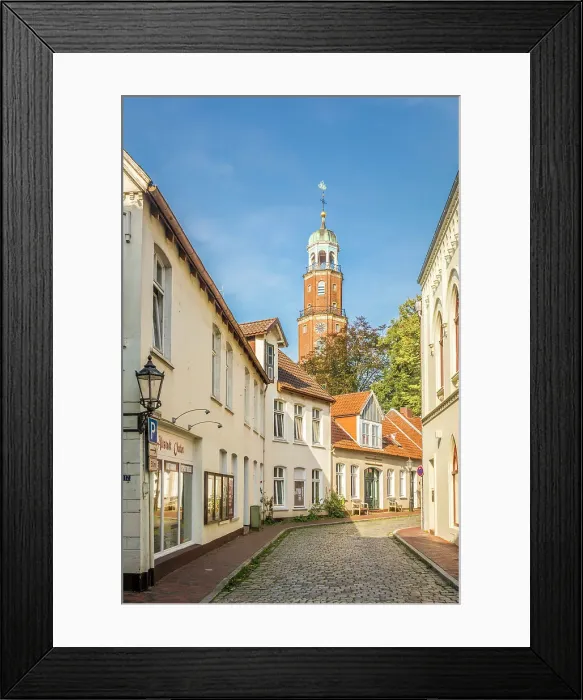 Framed Print : Old town alley with a view of the Great Church, Leer, East Frisia, Lower Saxony, Germany Framed Print : Old town alley with a view of the Great Church, Leer, East Frisia, Lower Saxony, Germany