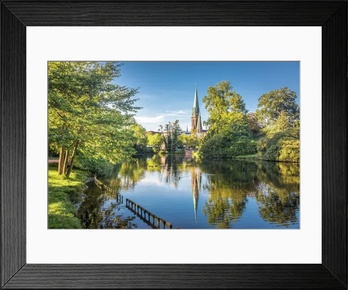 Framed Print : Castle pond in the castle garden with a view of St. Lamberti Church, Oldenburg, Oldenburger Land, Lower Saxony, Germany Framed Print : Castle pond in the castle garden with a view of St. Lamberti Church, Oldenburg, Oldenburger Land, Lower Saxony, Germany