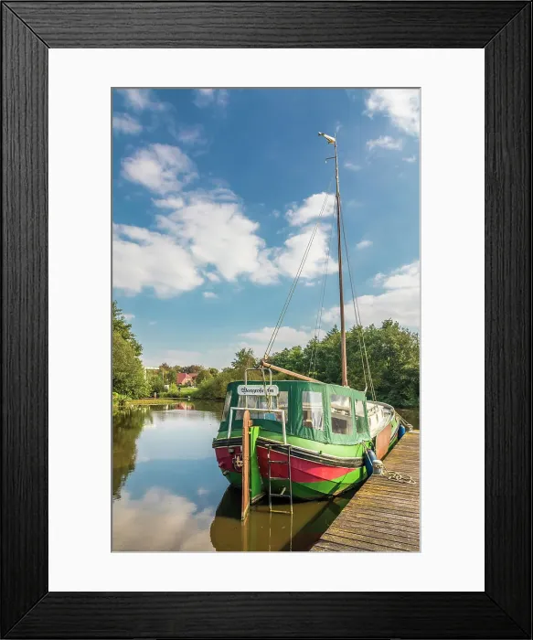 Framed Print : Typical canal boat on the Fehntjer Tief canal, Grossefehn, East Frisia, Lower Saxony, Germany Framed Print : Typical canal boat on the Fehntjer Tief canal, Grossefehn, East Frisia, Lower Saxony, Germany