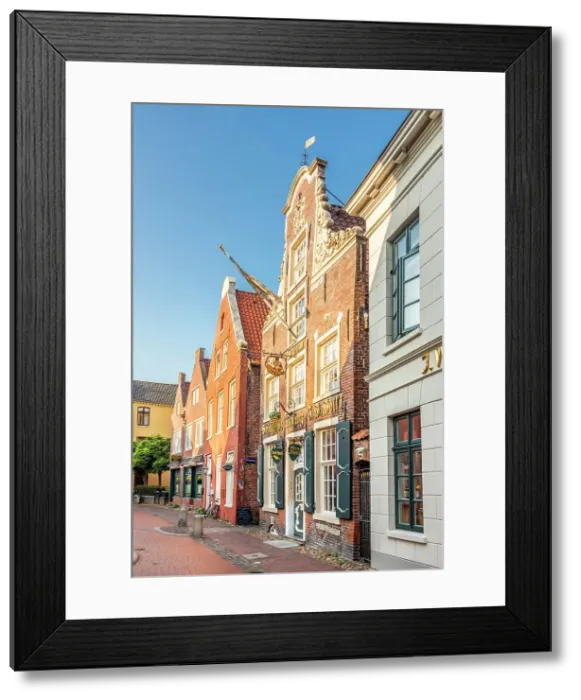 Framed Print : Historic houses on Rathausstrasse in the old town, Leer, East Frisia, Lower Saxony, Germany Framed Print : Historic houses on Rathausstrasse in the old town, Leer, East Frisia, Lower Saxony, Germany