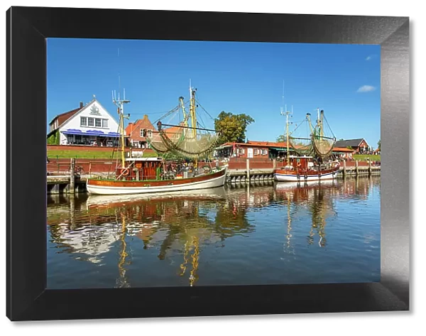 Harbor with shrimp boats in Greetsiel, East Frisia, North Sea, Germany, Europe