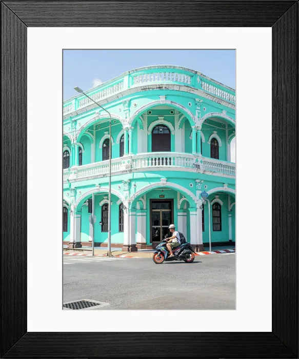 Framed Print : Scooter riding past beautiful buildings in the Old town, Phuket, Thailand