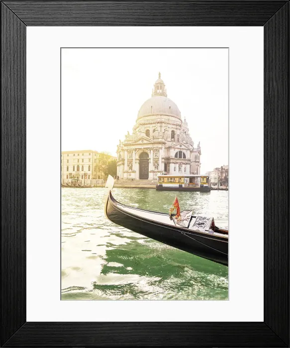 Framed Print : Bow of a gondola sailing in the Venetian Lagoon with Santa Maria della Salute Basilica on background, Venice, Veneto, Italy Framed Print : Bow of a gondola sailing in the Venetian Lagoon with Santa Maria della Salute Basilica on background, Venice, Veneto, Italy