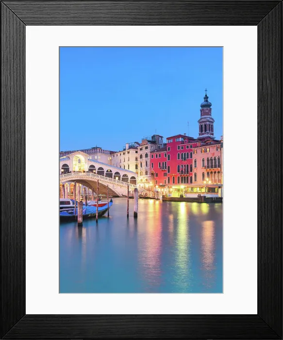 Framed Print : Rialto Bridge over the Grand Canal and historic buildings lit by street lanterns at dusk, Venice, Veneto, Italy Framed Print : Rialto Bridge over the Grand Canal and historic buildings lit by street lanterns at dusk, Venice, Veneto, Italy