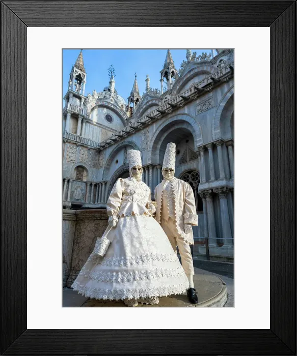 Framed Print : Masked couple posing in front of St Mark's Basilica during the carnival, Venice, Veneto, Italy Framed Print : Masked couple posing in front of St Mark's Basilica during the carnival, Venice, Veneto, Italy