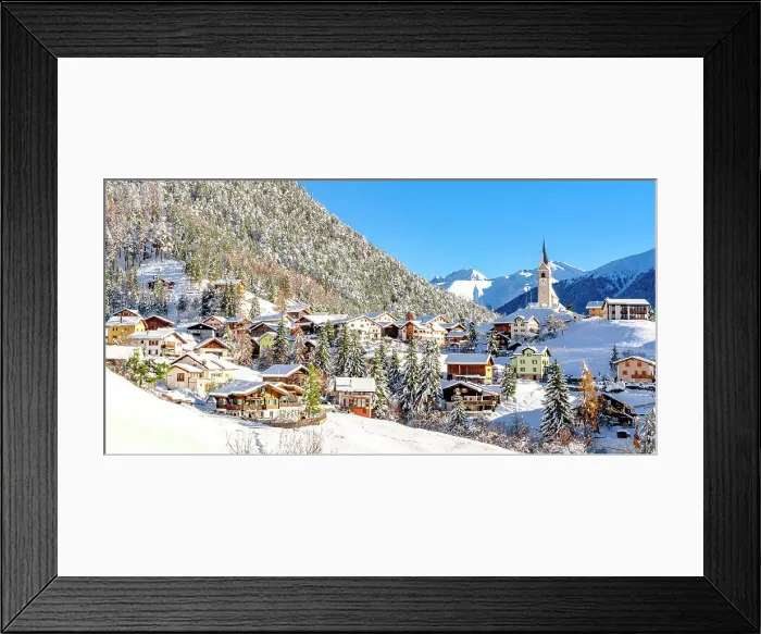 Framed Print : Snowy woods and mountains framing the alpine village of Alvaneu in winter, Davos, Graubunden canton, Switzerland Framed Print : Snowy woods and mountains framing the alpine village of Alvaneu in winter, Davos, Graubunden canton, Switzerland