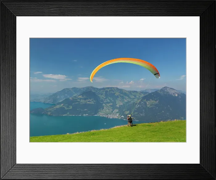 Framed Print : Paraglider on Niederbauen Mountain, Lake Lucerne, Canton Uri, Switzerland Framed Print : Paraglider on Niederbauen Mountain, Lake Lucerne, Canton Uri, Switzerland