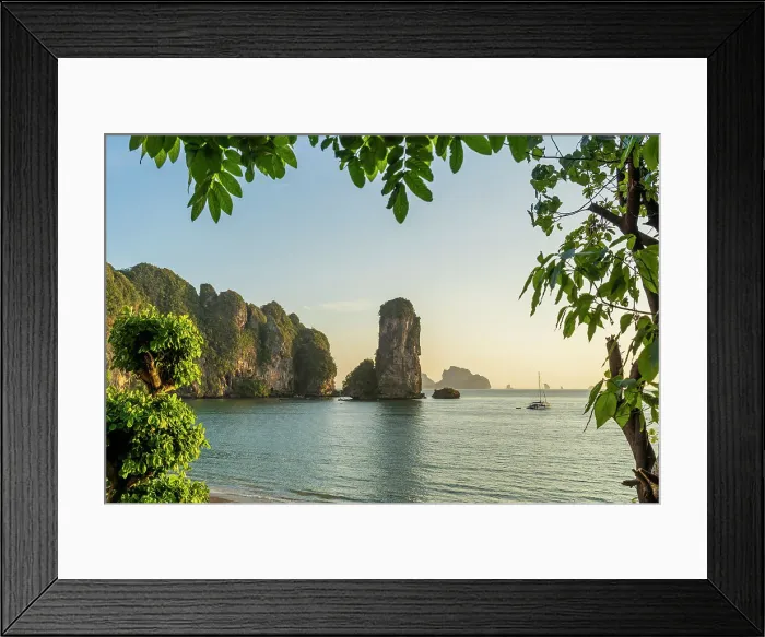 Framed Print : Limestone Karst tower framed by trees on Pai Plong Beach, Ao Nang, Krabi, Thailand Framed Print : Limestone Karst tower framed by trees on Pai Plong Beach, Ao Nang, Krabi, Thailand
