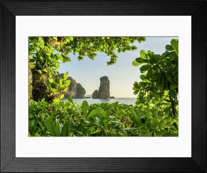 Framed Print : Limestone Karst tower framed by trees on Pai Plong Beach, Ao Nang, Krabi, Thailand