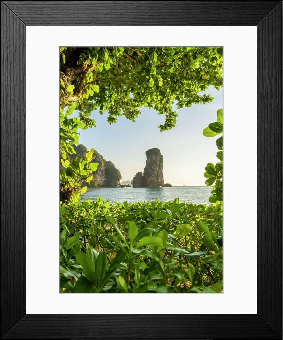 Framed Print : Limestone Karst tower framed by trees on Pai Plong Beach, Ao Nang, Krabi, Thailand Framed Print : Limestone Karst tower framed by trees on Pai Plong Beach, Ao Nang, Krabi, Thailand