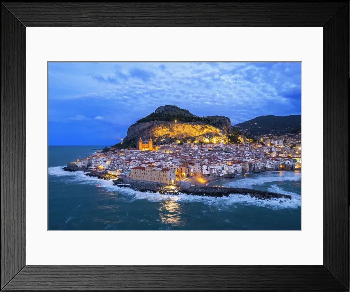 Framed Print : Aerial view of the illuminated Cefalu with the main cathedral and the rock behind the village, dusk time, Cefalu, Palermo province, Tyrrhenian sea, Sicily, Italy Framed Print : Aerial view of the illuminated Cefalu with the main cathedral and the rock behind the village, dusk time, Cefalu, Palermo province, Tyrrhenian sea, Sicily, Italy