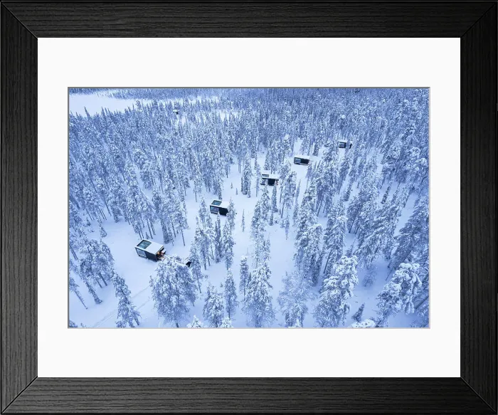 Framed Print : Glass cabins set on the middle of the frozen forest covered with snow at dusk, Finnish Lapland, Finland Framed Print : Glass cabins set on the middle of the frozen forest covered with snow at dusk, Finnish Lapland, Finland