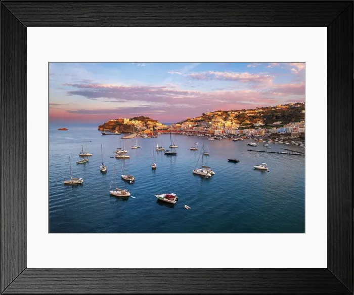 Framed Print : Sunset above the colorful fishing village of Ponza with boats anchored in the bay, aerial view, Ponza island, Pontine islands, Tyrrhenian Sea, Latina province, Latium, Italy Framed Print : Sunset above the colorful fishing village of Ponza with boats anchored in the bay, aerial view, Ponza island, Pontine islands, Tyrrhenian Sea, Latina province, Latium, Italy