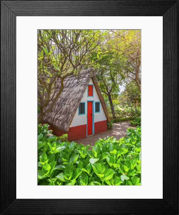 Framed Print : Traditional thatched triangular house inside Botanical garden of Madeira, Santa Maria Maior, Funchal, Madeira island, Portugal Framed Print : Traditional thatched triangular house inside Botanical garden of Madeira, Santa Maria Maior, Funchal, Madeira island, Portugal