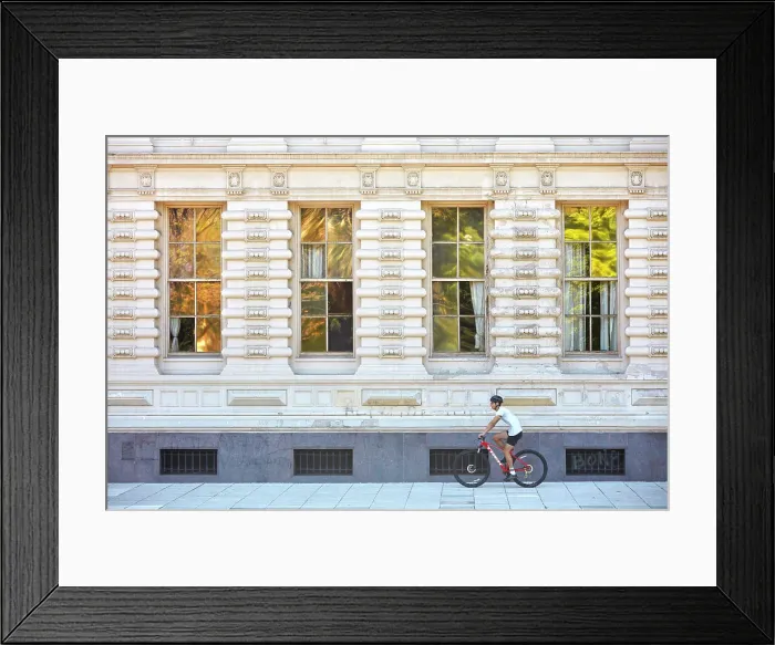 Framed Print : A person riding a bike in front of the main facade of Palacio Sarmiento, Recoleta, Buenos Aires, Argentina. An eclectic style building declared national historic monument Framed Print : A person riding a bike in front of the main facade of Palacio Sarmiento, Recoleta, Buenos Aires, Argentina. An eclectic style building declared national historic monument