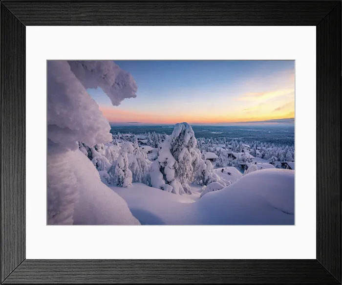 Framed Print : Scenic sunrise over a frozen snowy forest surrounding the fairy tale village of Pudasjarvi after a blizzard, Lapland, Finland Framed Print : Scenic sunrise over a frozen snowy forest surrounding the fairy tale village of Pudasjarvi after a blizzard, Lapland, Finland