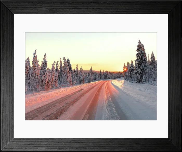 Framed Print : Empty icy road in the winter forest covered with snow at sunset, Iso Syote, Lapland, Finland Framed Print : Empty icy road in the winter forest covered with snow at sunset, Iso Syote, Lapland, Finland