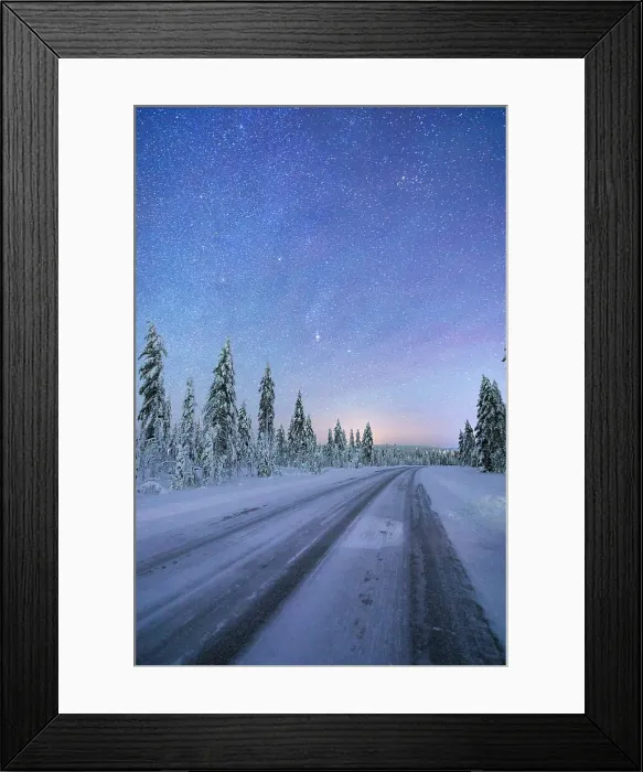 Framed Print : Empty snowy road crossing a frozen forest under the Northern Lights sky, Iso Syote, Lapland, Finland Framed Print : Empty snowy road crossing a frozen forest under the Northern Lights sky, Iso Syote, Lapland, Finland