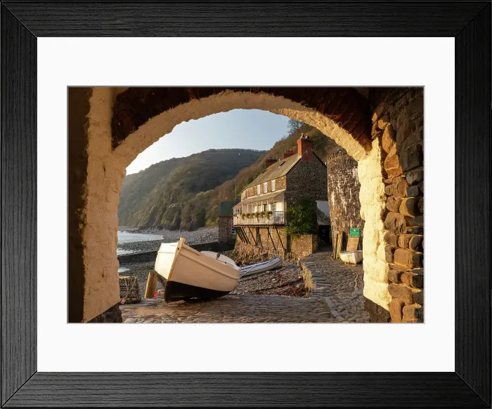 Framed Print : Clovelly harbour through archway, Devon, England. Spring (April) 2019 Framed Print : Clovelly harbour through archway, Devon, England. Spring (April) 2019