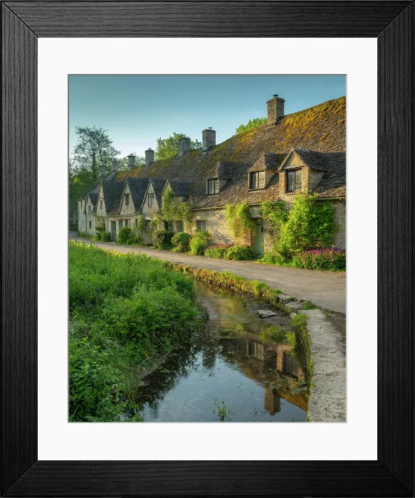 Framed Print : Arlington Row cottages in the pretty Cotswold village of Bibury, Gloucestershire, England. Spring (May) 2019 Framed Print : Arlington Row cottages in the pretty Cotswold village of Bibury, Gloucestershire, England. Spring (May) 2019
