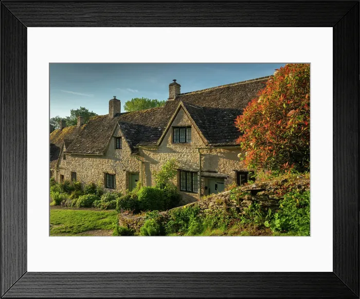Framed Print : Idyllic cottages in Arlington Row in the pretty Cotswolds village of Bibury, Gloucestershire, England. Spring (May) 2019 Framed Print : Idyllic cottages in Arlington Row in the pretty Cotswolds village of Bibury, Gloucestershire, England. Spring (May) 2019