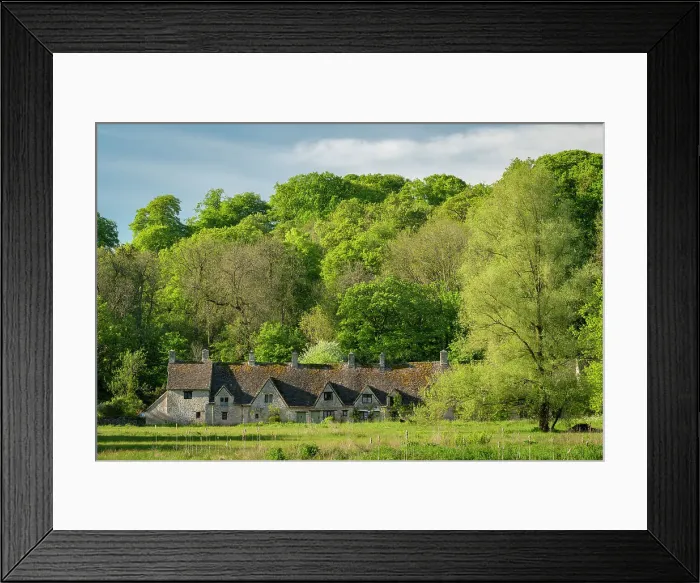 Framed Print : Arlington Row cottages in the pretty Cotswolds village of Bibury, Gloucestershire, England. Spring (May) 2019