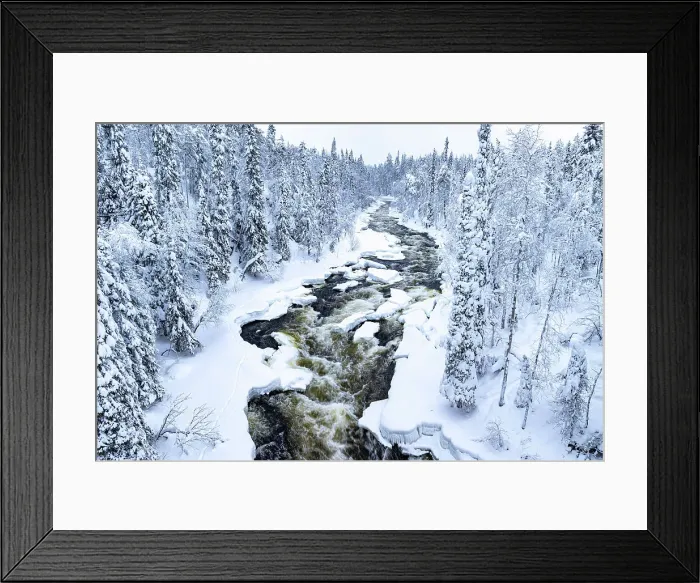 Framed Print : Aerial view of river flowing in the frozen snowy forest, Myllykoski, Oulanka National Park, Kuusamo, Lapland, Finland Framed Print : Aerial view of river flowing in the frozen snowy forest, Myllykoski, Oulanka National Park, Kuusamo, Lapland, Finland