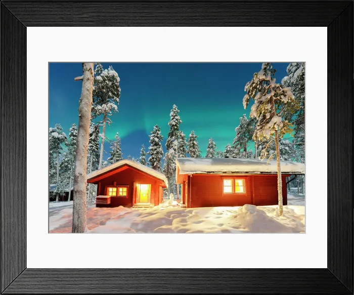 Framed Print : Northern Lights over illuminated log cabins set among frozen trees in a snowy forest, Lapland, Finland Framed Print : Northern Lights over illuminated log cabins set among frozen trees in a snowy forest, Lapland, Finland