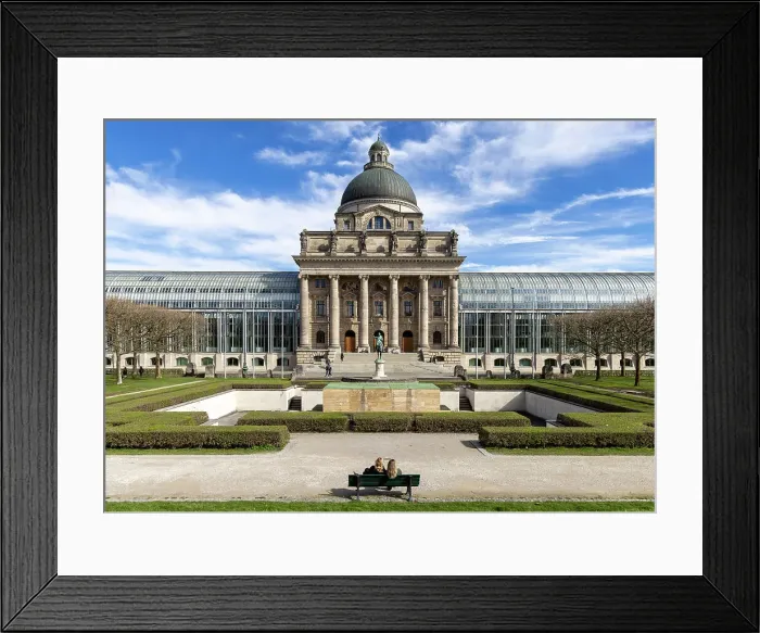 Framed Print : Two people sit opposite the Bavarian State Chancellery, Munich, Bavaria, Germany Framed Print : Two people sit opposite the Bavarian State Chancellery, Munich, Bavaria, Germany