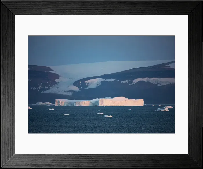 Framed Print : Icebergs at dusk off of Qaanaaq formerly known as Thule or New Thule, is the main town in the northern part of the Avannaata municipality in northwestern Greenland Framed Print : Icebergs at dusk off of Qaanaaq formerly known as Thule or New Thule, is the main town in the northern part of the Avannaata municipality in northwestern Greenland
