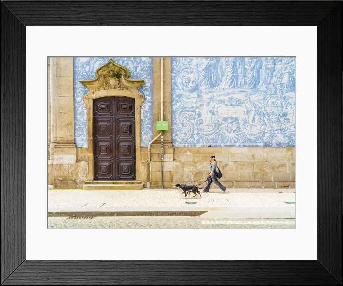 Framed Print : A woman walking past the tiled wall of Carmo Church, Porto, Portugal, Europe Framed Print : A woman walking past the tiled wall of Carmo Church, Porto, Portugal, Europe