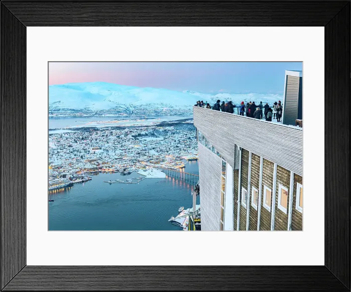 Framed Print : Tourists admiring sunset over the snowy city of Tromso standing on terrace at Fjellheisen viewpoint, Norway Framed Print : Tourists admiring sunset over the snowy city of Tromso standing on terrace at Fjellheisen viewpoint, Norway