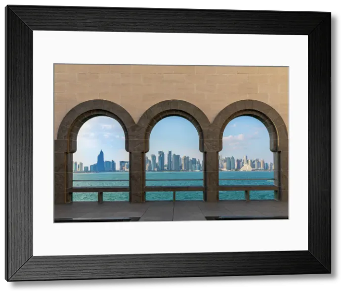 Framed Print : The Museum of Islamic Art with the West Bay in the Background, Doha, Qatar Framed Print : The Museum of Islamic Art with the West Bay in the Background, Doha, Qatar