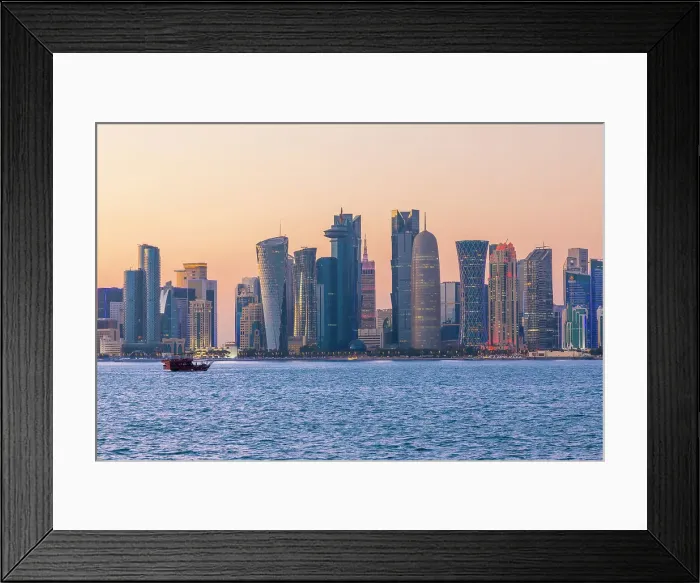 Framed Print : A Dhow in the Harbour with the West Bay Skyline at Dusk, Doha, Qatar
