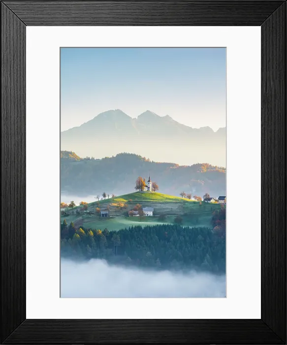 Framed Print : Church of St. Thomas and the Kamink Savinja Alps in winter, Skofja Loka, Slovenia Framed Print : Church of St. Thomas and the Kamink Savinja Alps in winter, Skofja Loka, Slovenia
