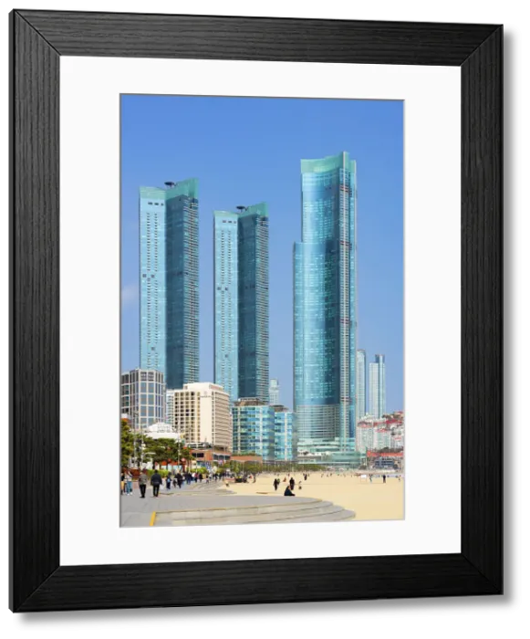Framed Print : People walking along promenade of Haeundae Beach, Busan, South Korea Framed Print : People walking along promenade of Haeundae Beach, Busan, South Korea