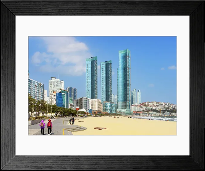 Framed Print : People walking along promenade of Haeundae Beach, Busan, South Korea Framed Print : People walking along promenade of Haeundae Beach, Busan, South Korea