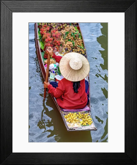 Framed Print : Woman on traditional rowing boat at the floating market of Damnoen Saduak, Ratchaburi District, Bangkok, Thailand