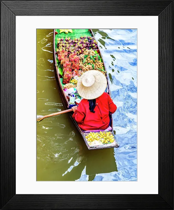 Framed Print : Overhead view of Asian woman with hat selling fruit at Damnoen Saduak floating market, Bangkok, Thailand