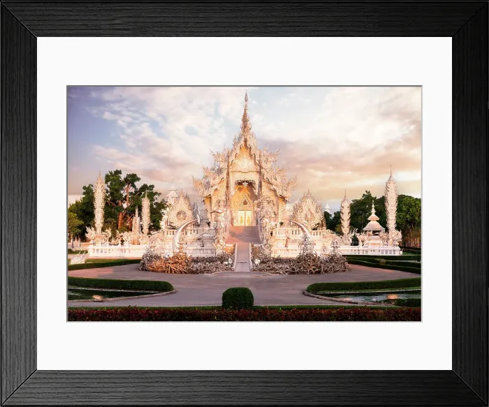 Framed Print : Dramatic sky at dawn over the surreal Wat Rong Khun (White Temple) buddhist landmark, Chiang Rai, Thailand Framed Print : Dramatic sky at dawn over the surreal Wat Rong Khun (White Temple) buddhist landmark, Chiang Rai, Thailand