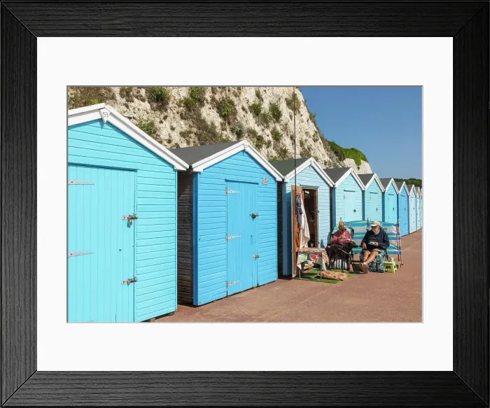 Framed Print : England, Kent, Broadstairs, Stone Bay, Row of Colourful Beach Huts, Elderly Hut Owners Eating Breakfast