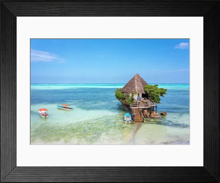 Framed Print : The Rock is a unique ocean restaurant nestled on the shores of Michamvi Pingwe Beach in Zanzibar, Tanzania, Africa Framed Print : The Rock is a unique ocean restaurant nestled on the shores of Michamvi Pingwe Beach in Zanzibar, Tanzania, Africa