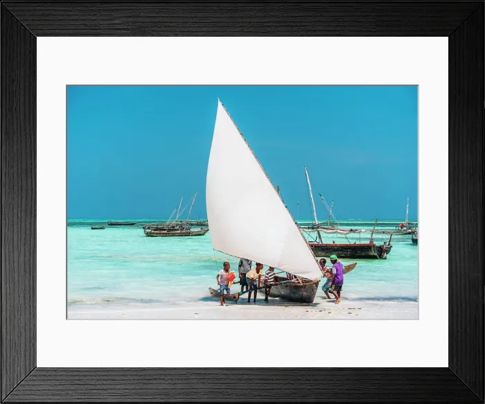 Framed Print : Boat on the shore at low tide, Nungwi, Zanzibar, Tanzania, Africa