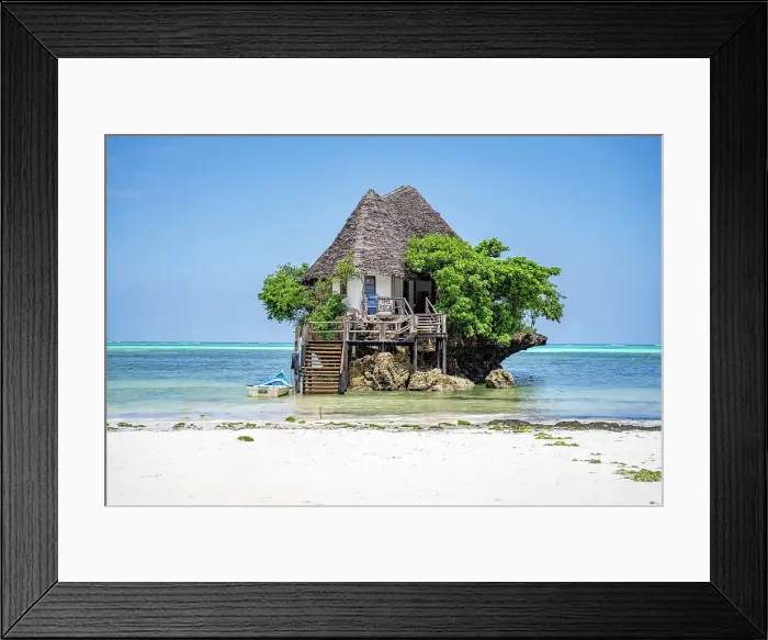 Framed Print : The Rock is a unique ocean restaurant nestled on the shores of Michamvi Pingwe Beach in Zanzibar, Tanzania, Africa Framed Print : The Rock is a unique ocean restaurant nestled on the shores of Michamvi Pingwe Beach in Zanzibar, Tanzania, Africa