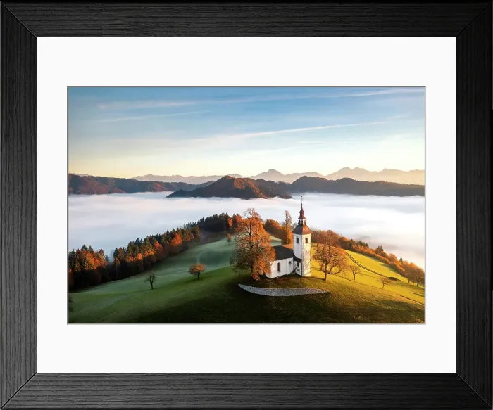 Framed Print : Church of St. Thomas and the Kamink Savinja Alps in winter, Skofja Loka, Slovenia Framed Print : Church of St. Thomas and the Kamink Savinja Alps in winter, Skofja Loka, Slovenia