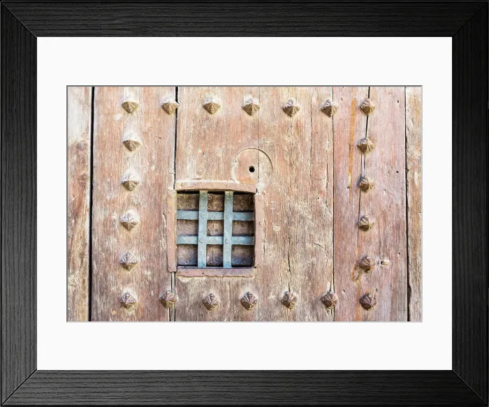 Framed Print : Medieval door with a peephole covered in metal bars, Casa Punt de Gantxo, Valencia, Spain Framed Print : Medieval door with a peephole covered in metal bars, Casa Punt de Gantxo, Valencia, Spain