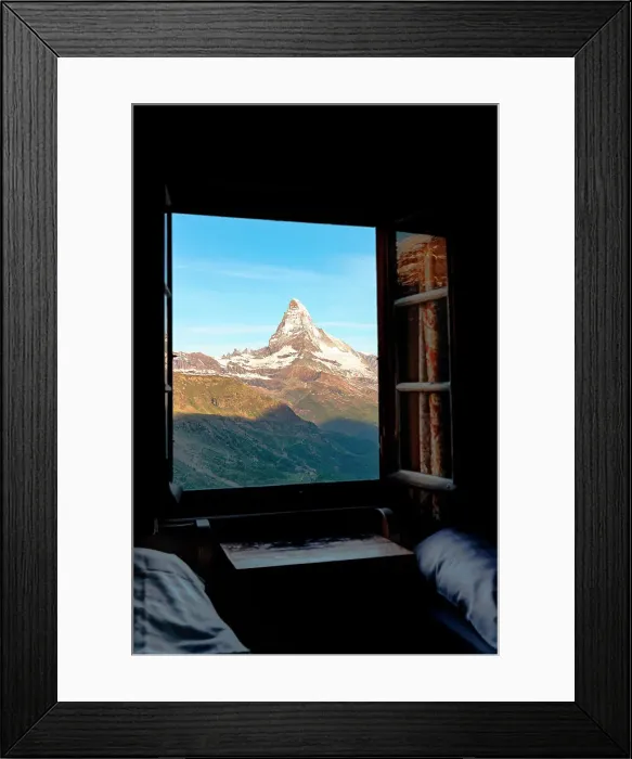 Framed Print : Matterhorn peak at dawn view through a window of a mountain hut, Zermatt, Canton of Valais, Switzerland Framed Print : Matterhorn peak at dawn view through a window of a mountain hut, Zermatt, Canton of Valais, Switzerland
