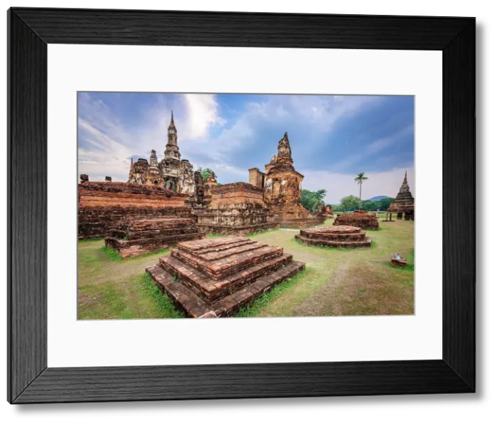 Framed Print : Buddhist temple and pagoda built from bricks, Wat Mahathat, Sukhothai Historical Park, Sukhothai, Thailand Framed Print : Buddhist temple and pagoda built from bricks, Wat Mahathat, Sukhothai Historical Park, Sukhothai, Thailand